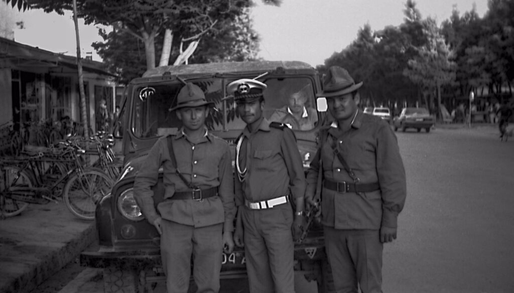 Afghan traffic police with Soviet soldiers.