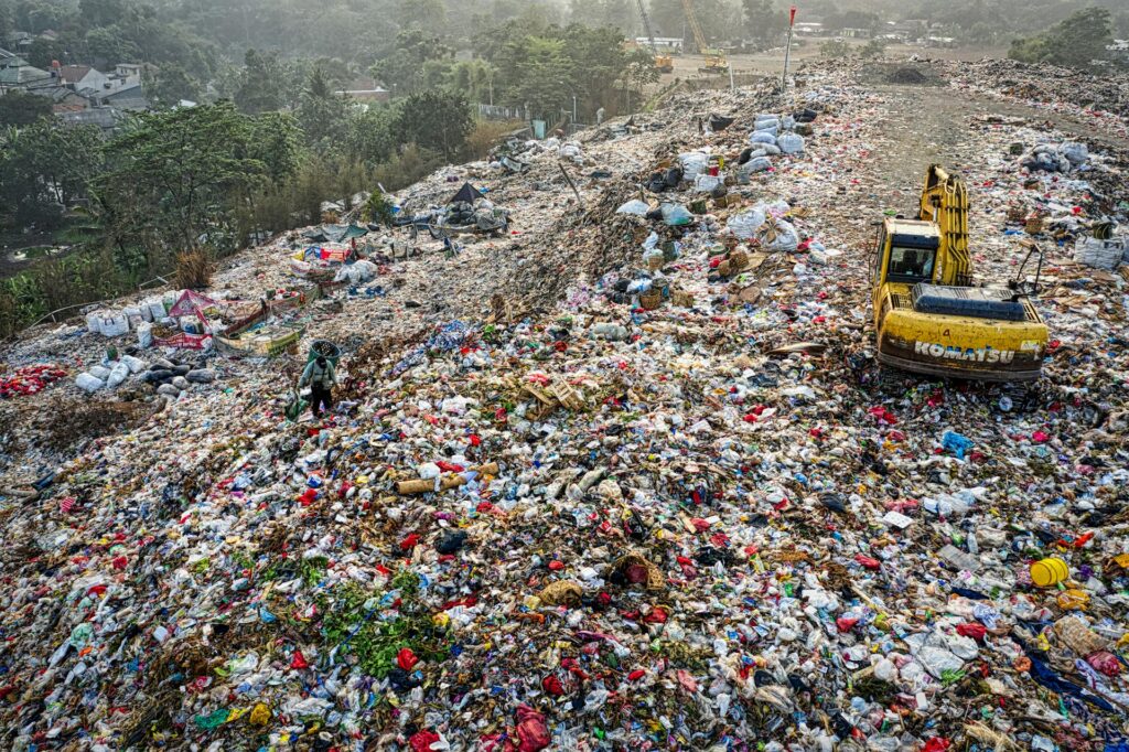 What are the ethical implications of allowing someone to dig up a landfill in search of lost treasure?